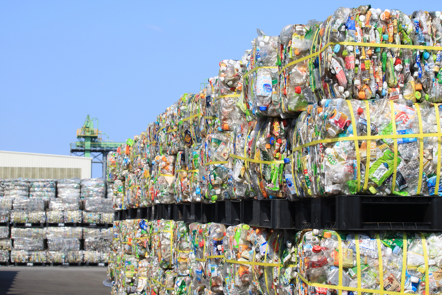 A pile of PET bottles piled up in a recycling facility